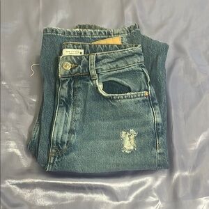 Distressed Blue Jeans